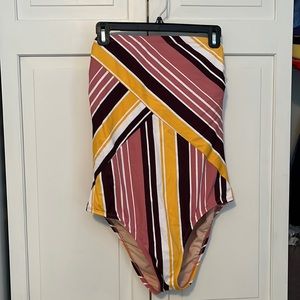 NWT: XL (size 16-18) one piece back lace up swimsuit.